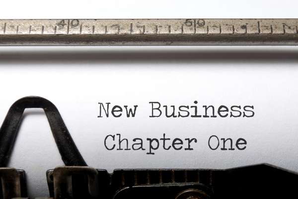 New business chapter one on a type writer