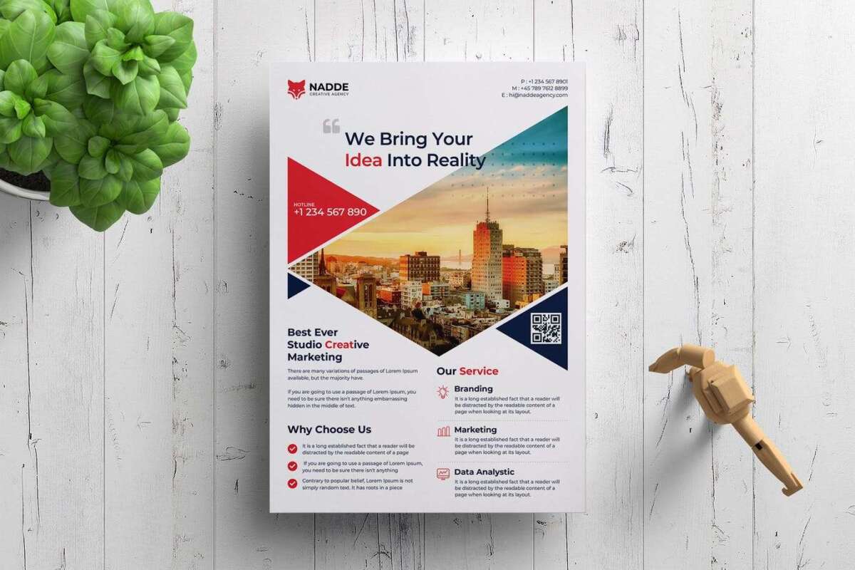 A natural wooden background with a colorful corporate flyer design
